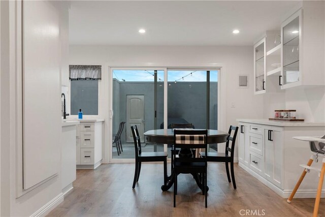 17730 Regency Cir, Bellflower, CA 90706 - dining space with baseboards, light wood-type flooring, and recessed lighting