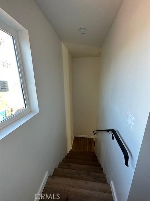 5507 S Manhattan Pl, Los Angeles, CA 90062 - stairway with wood finished floors