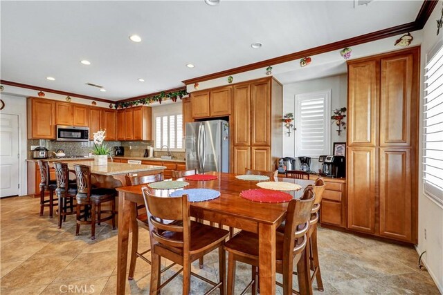 31710 Waterfall Way, Murrieta, CA 92563 - dining area featuring recessed lighting and crown molding