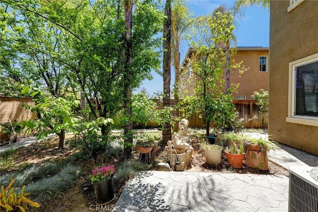 31710 Waterfall Way, Murrieta, CA 92563 - view of yard with central AC unit, fence, and a patio