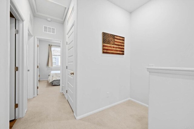 40603 Melrose Dr, Temecula, CA 92591 - corridor featuring light colored carpet, attic access, visible vents, and baseboards