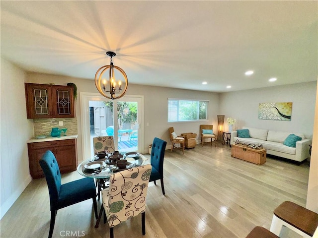 9556 Bloomfield St, Cypress, CA 90630 - dining room with a chandelier, light wood finished floors, and recessed lighting