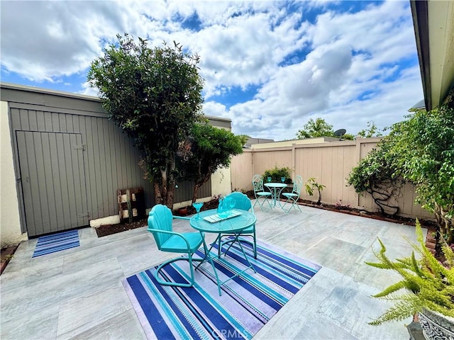 9556 Bloomfield St, Cypress, CA 90630 - view of patio featuring a fenced backyard