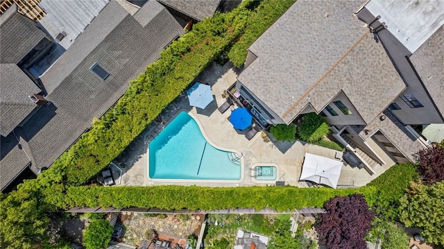 drone / aerial view of a pool
