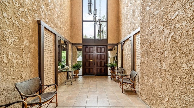 building lobby featuring a towering ceiling