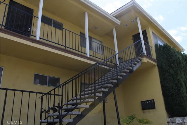 view of building exterior featuring stairway