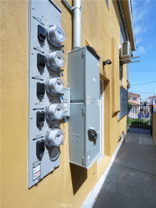 2302 S Gaffey St Unit 1, San Pedro, CA 90731 - exterior view of stucco siding, electric meter, and fence