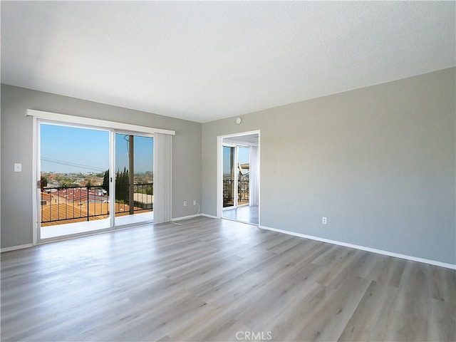 2302 S Gaffey St Unit 1, San Pedro, CA 90731 - unfurnished room with wood finished floors and baseboards