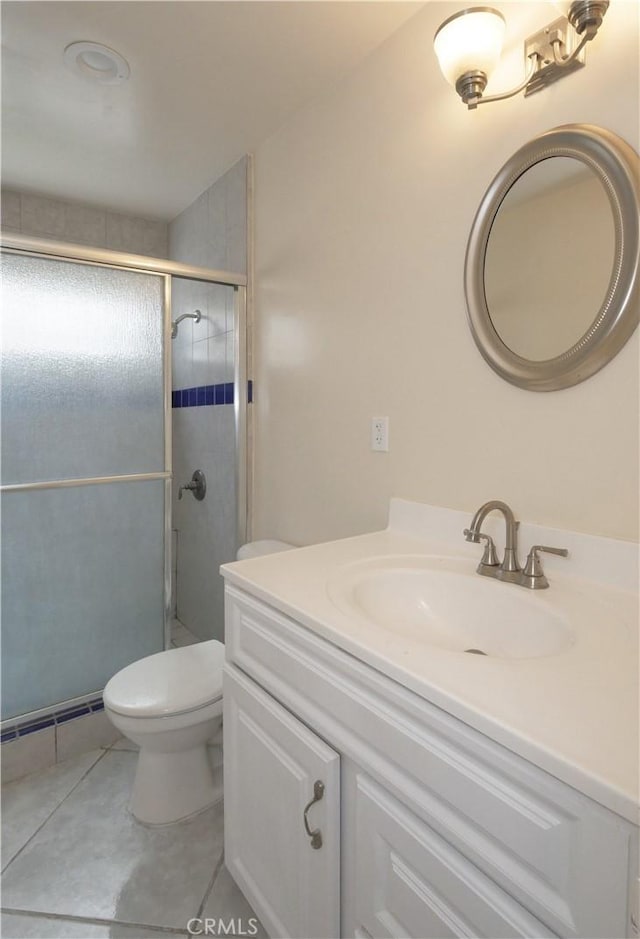 2302 S Gaffey St Unit 1, San Pedro, CA 90731 - full bath featuring a stall shower, vanity, tile patterned flooring, and toilet