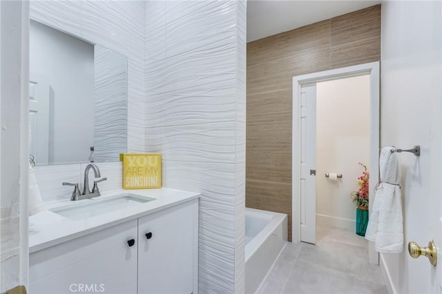 1449 W 45th St, Los Angeles, CA 90062 - full bath featuring vanity, a tub to relax in, baseboards, and tile walls