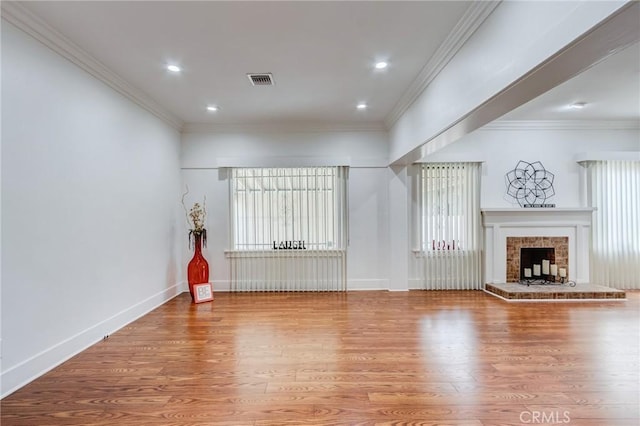 1449 W 45th St, Los Angeles, CA 90062 - unfurnished living room with wood finished floors, crown molding, a fireplace, baseboards, and recessed lighting