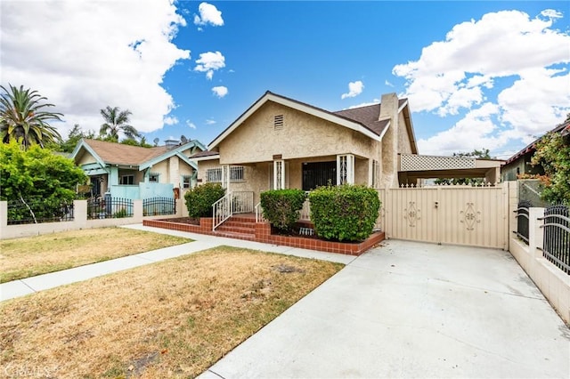 1449 W 45th St, Los Angeles, CA 90062 - bungalow-style house with a gate and stucco siding