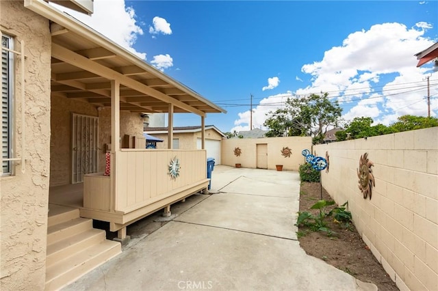 1449 W 45th St, Los Angeles, CA 90062 - view of patio with an outdoor structure