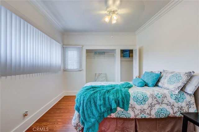 1449 W 45th St, Los Angeles, CA 90062 - bedroom featuring crown molding, a closet, wood finished floors, baseboards, and ceiling fan