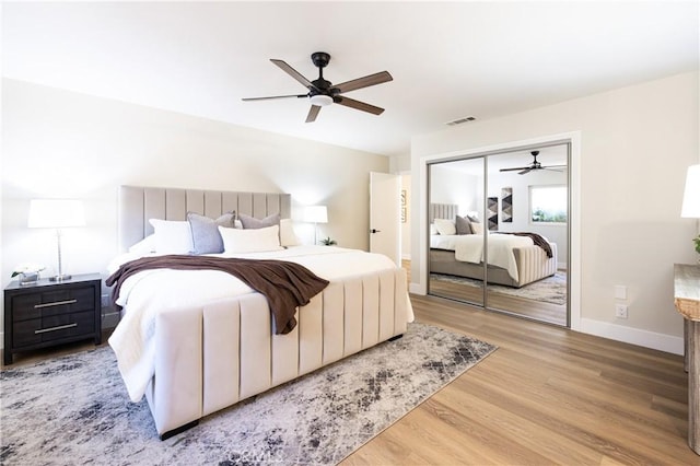 29284 Big Range Rd, Canyon Lake, CA 92587 - bedroom featuring light wood-style flooring, a closet, baseboards, and ceiling fan