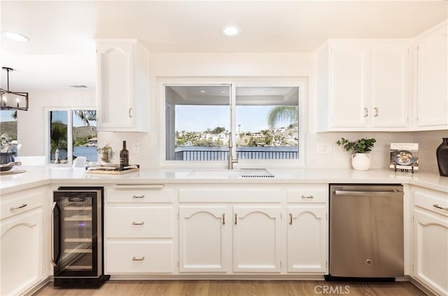 29284 Big Range Rd, Canyon Lake, CA 92587 - indoor bar featuring beverage cooler, dishwasher, a chandelier, and recessed lighting
