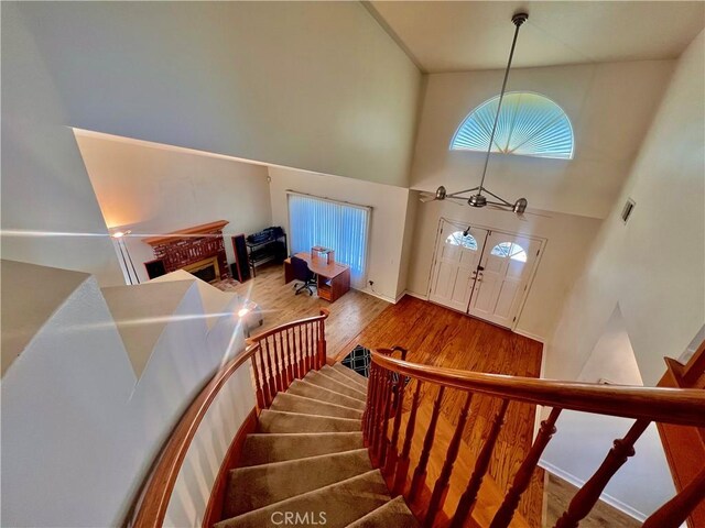 18725 Dallas Ave, Riverside, CA 92508 - stairway with a high ceiling and wood finished floors