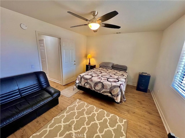 18725 Dallas Ave, Riverside, CA 92508 - bedroom with baseboards, ceiling fan, and wood finished floors