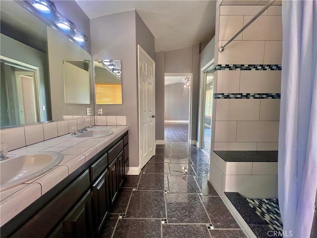 18725 Dallas Ave, Riverside, CA 92508 - full bath with baseboards, a shower, double vanity, and a sink