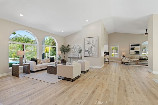44240 La Cruz Dr, Temecula, CA 92590 - living area with a ceiling fan, baseboards, wood-type flooring, and high vaulted ceiling