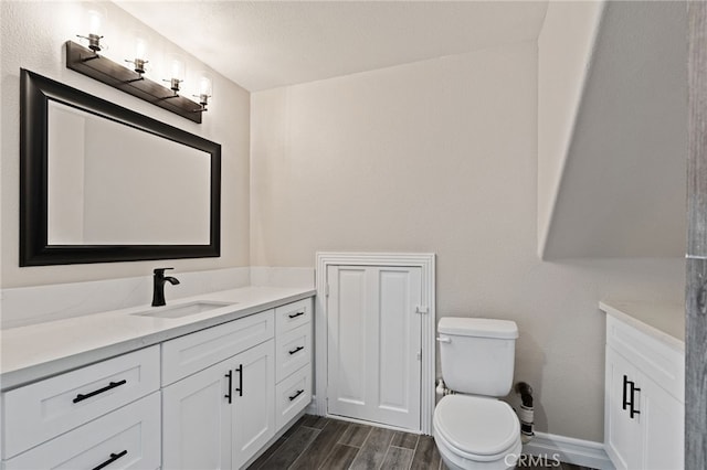 44240 La Cruz Dr, Temecula, CA 92590 - bathroom featuring vanity, toilet, and wood finished floors