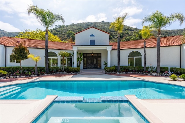 44240 La Cruz Dr, Temecula, CA 92590 - view of pool with a mountain view and a pool with connected hot tub