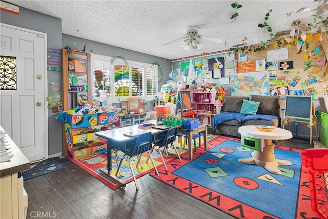 9546 Verdugo Ave, Hesperia, CA 92345 - game room with ceiling fan, a textured ceiling, and wood finished floors