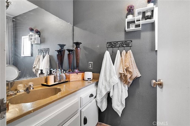9546 Verdugo Ave, Hesperia, CA 92345 - bathroom featuring vanity and a textured wall