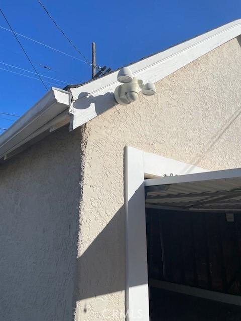 exterior details featuring stucco siding