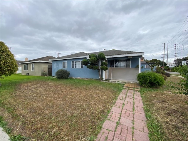 3428 W 189th St, Torrance, CA 90504 - view of front of house with stucco siding and a front yard