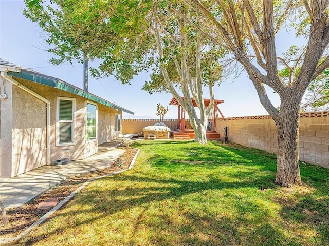 view of yard featuring a fenced backyard