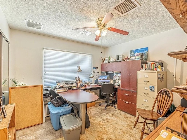office area with ceiling fan, visible vents, and a textured ceiling