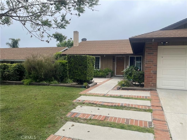 single story home with roof with shingles, brick siding, a garage, a front lawn, and a chimney