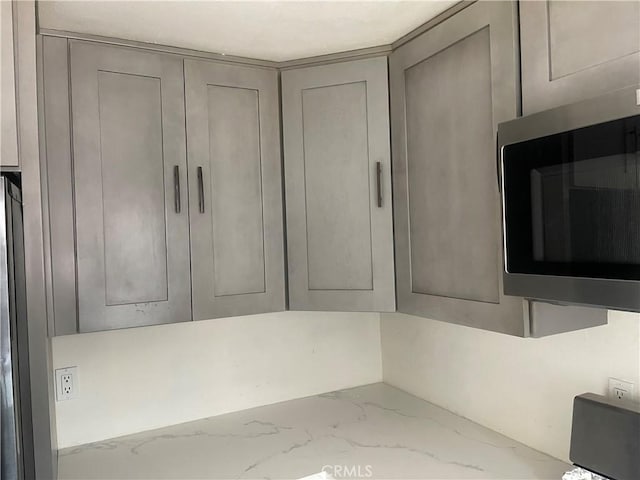 room details featuring stainless steel microwave