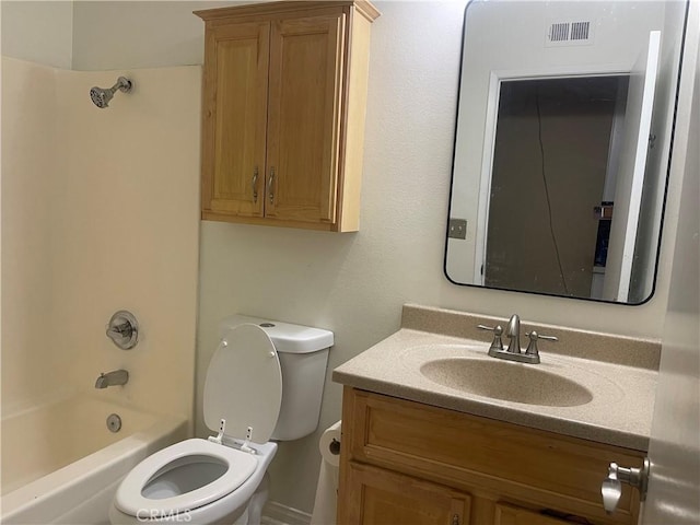 bathroom featuring vanity, toilet, bathing tub / shower combination, and visible vents