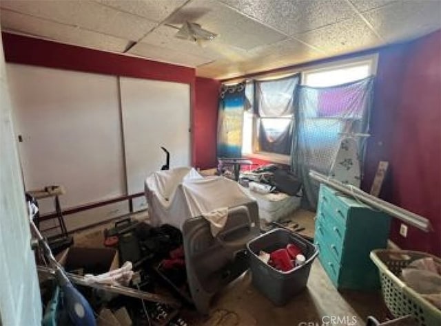 misc room featuring a paneled ceiling