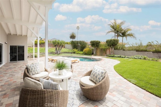 view of patio featuring a fenced in pool and a fenced backyard