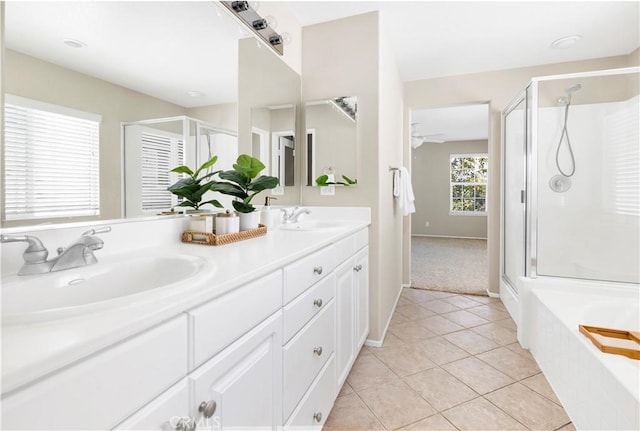 39992 Pasadena Dr, Temecula, CA 92591 - bathroom featuring a shower stall, tile patterned floors, double vanity, a garden tub, and baseboards