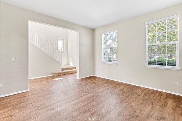 39992 Pasadena Dr, Temecula, CA 92591 - spare room featuring healthy amount of natural light, wood finished floors, and baseboards