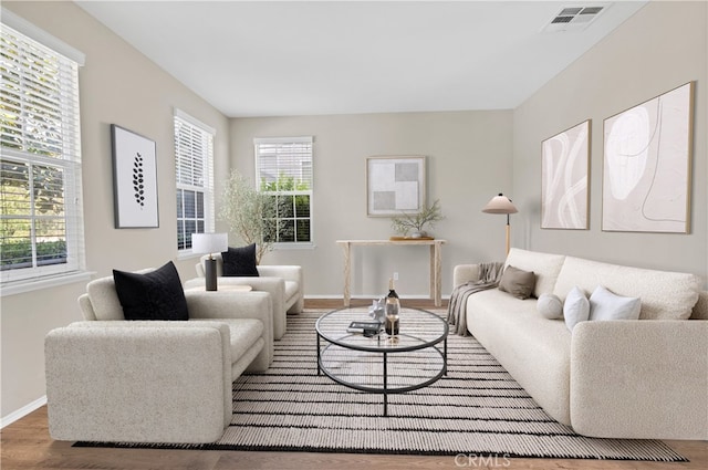 39992 Pasadena Dr, Temecula, CA 92591 - living area with baseboards, plenty of natural light, and wood finished floors