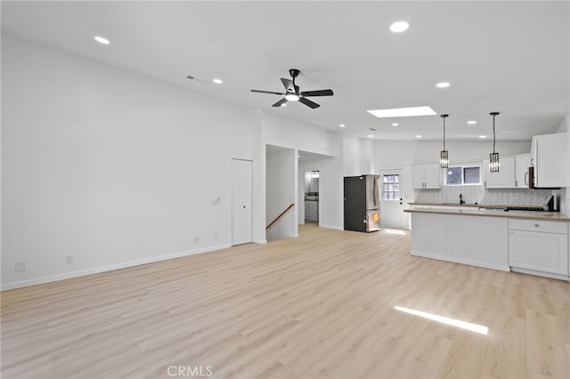 3516 Illinois Trl, Frazier Park, CA 93225 - unfurnished living room with light wood-type flooring, a ceiling fan, and recessed lighting