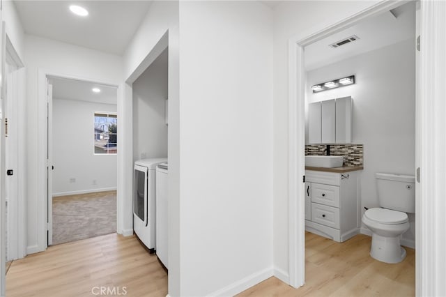 3516 Illinois Trl, Frazier Park, CA 93225 - washroom with a sink, laundry area, visible vents, light wood-style floors, and recessed lighting