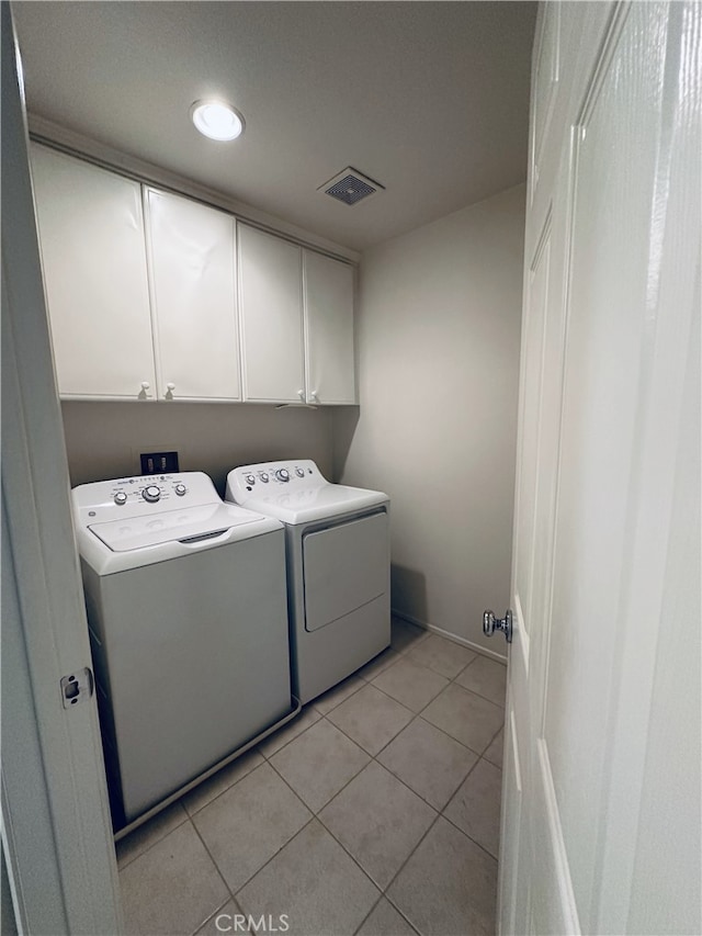 5 Chinaberry, Irvine, CA 92618 - laundry area with cabinet space, washing machine and dryer, light tile patterned floors, and recessed lighting