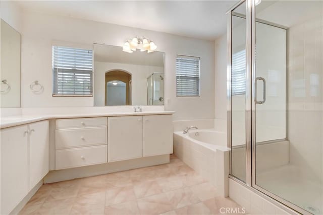 5 Chinaberry, Irvine, CA 92618 - full bath featuring a stall shower, healthy amount of natural light, a bath, and vanity