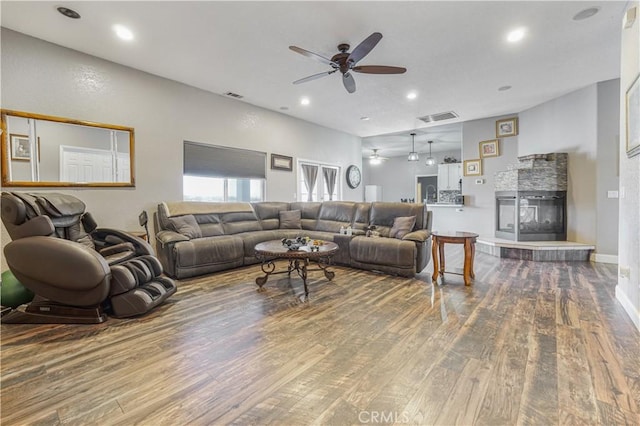 6748 Coriander Dr, Oak Hills, CA 92344 - living room with a ceiling fan, visible vents, recessed lighting, and wood finished floors