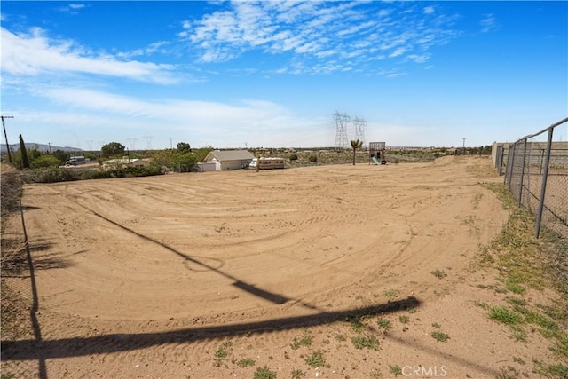 6748 Coriander Dr, Oak Hills, CA 92344 - view of yard featuring fence