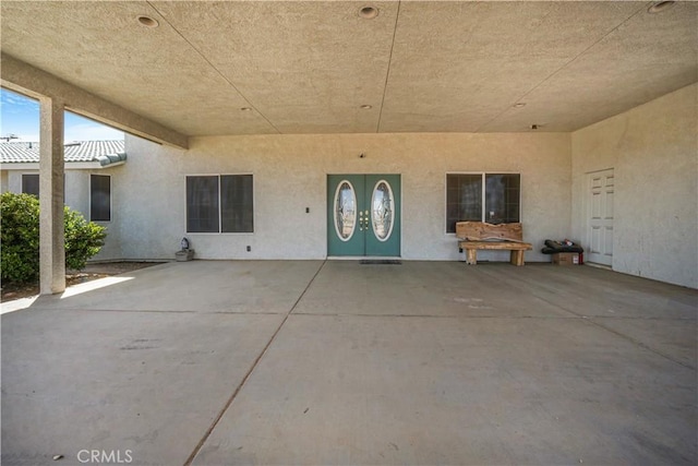 6748 Coriander Dr, Oak Hills, CA 92344 - view of exterior entry featuring stucco siding