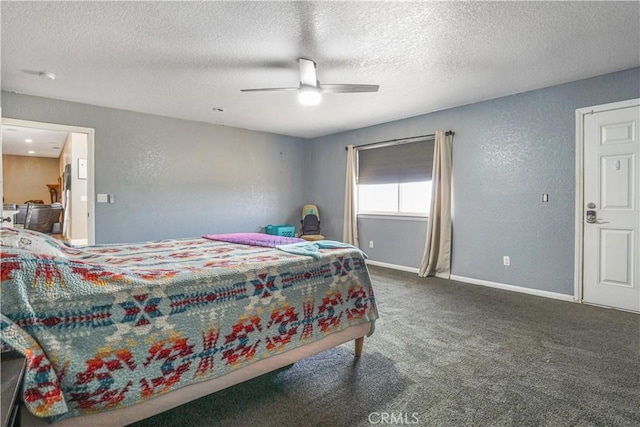 6748 Coriander Dr, Oak Hills, CA 92344 - bedroom with a ceiling fan, carpet floors, a textured ceiling, baseboards, and a textured wall