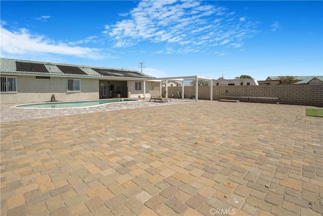 6748 Coriander Dr, Oak Hills, CA 92344 - exterior space featuring a patio area, a fenced in pool, and a fenced backyard