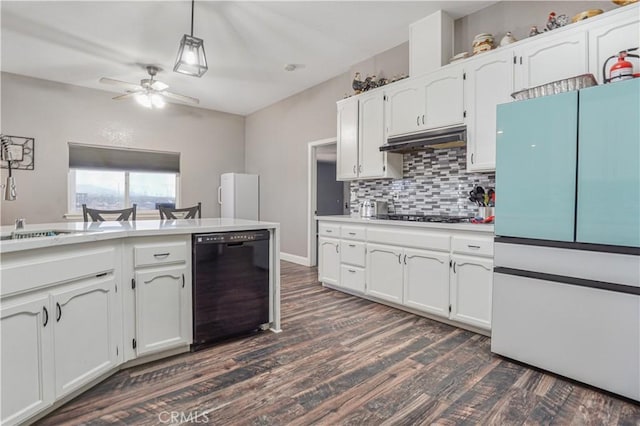 6748 Coriander Dr, Oak Hills, CA 92344 - kitchen featuring freestanding refrigerator, black dishwasher, under cabinet range hood, and dark wood-type flooring